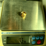 7.5 gram gold ring on scale
