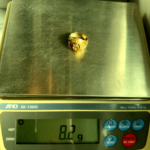 8.2 gram gold ring on scale