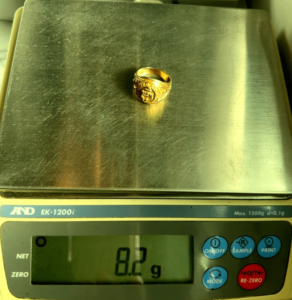 8.2 gram gold ring on scale