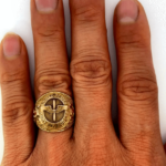 air force gold ring on hand