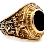 combat navigator ring - left view w/ gold and onyx