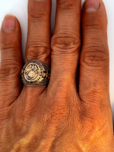 us marines gold ring on hand