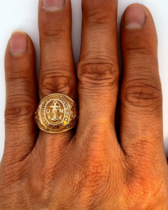 us navy gold ring on hand