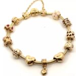 pandora moments 14k gold with 11 charms