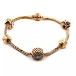 8.5in 14k gold charm bracelet
