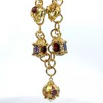 hanging 18k gold charm bracelet