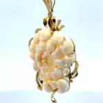 side view of cash for gold pendant
