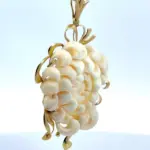 side view 14k natural color gold pendant